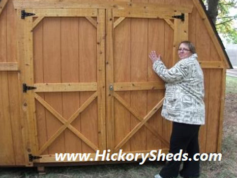 A woman happy with her new Hickory Shed